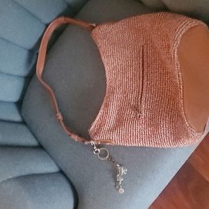 SAK multu colored purse with leather bottom and handle